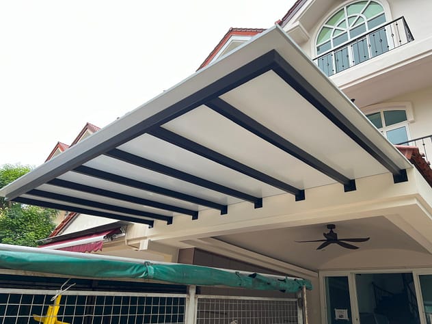 Home exterior enhanced with acp awning, aluminum composite awnings, and motorised blinds.